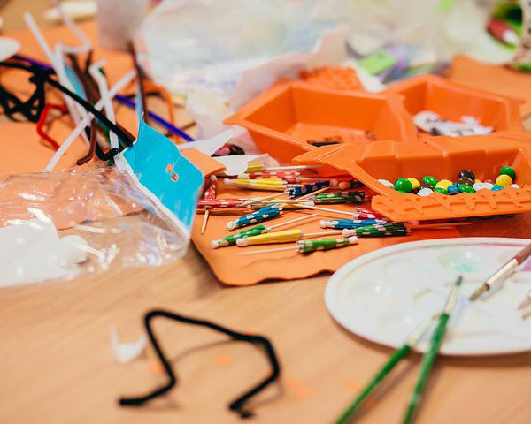 Crafts laid out on a wooden table